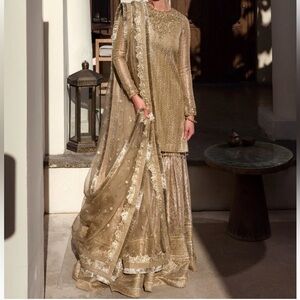 Luxurious Gold Faiza Saqlain Women's Dress with Intricate Detailing